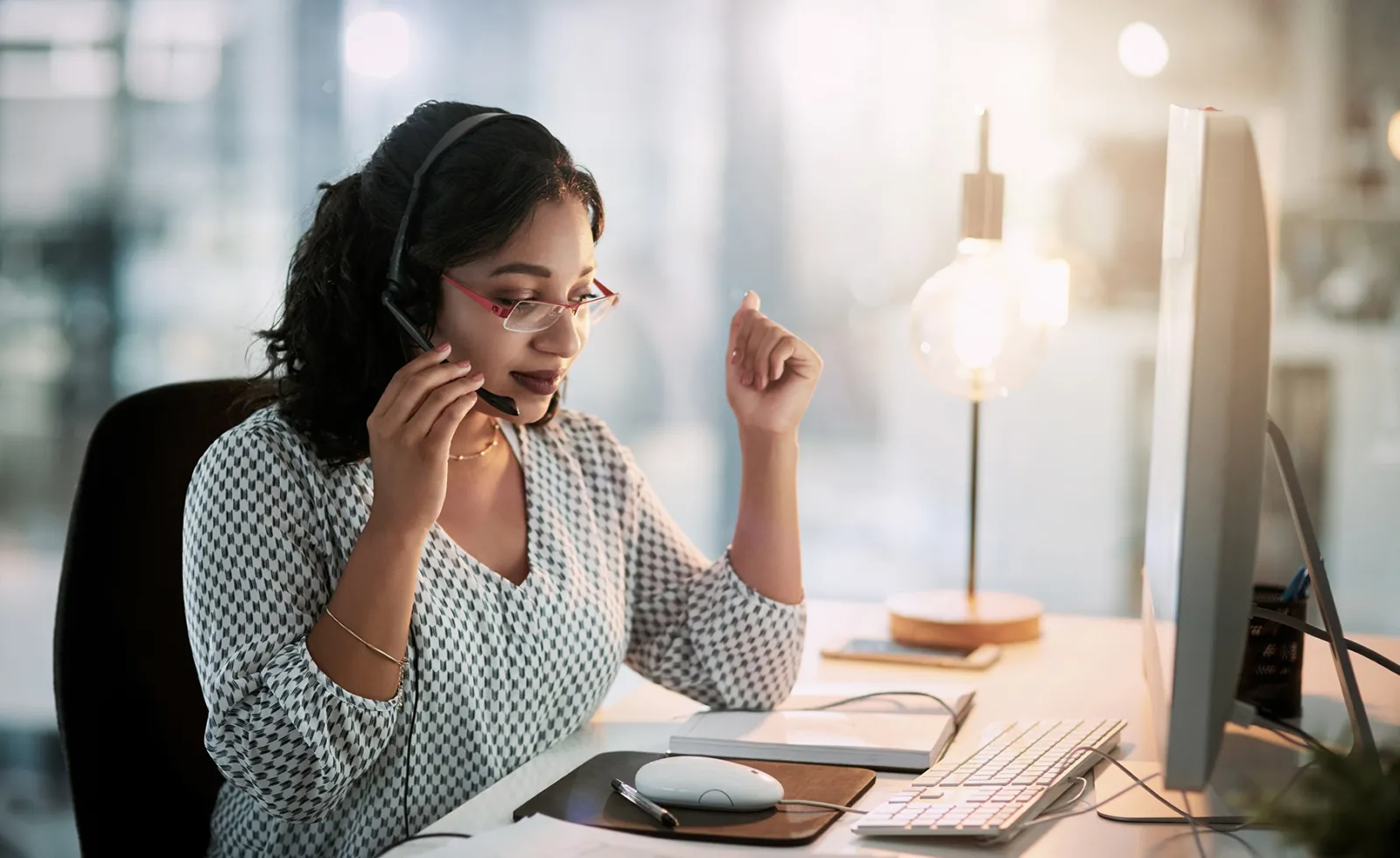  A business owner discusses potential 401(k) plans for her employees.
