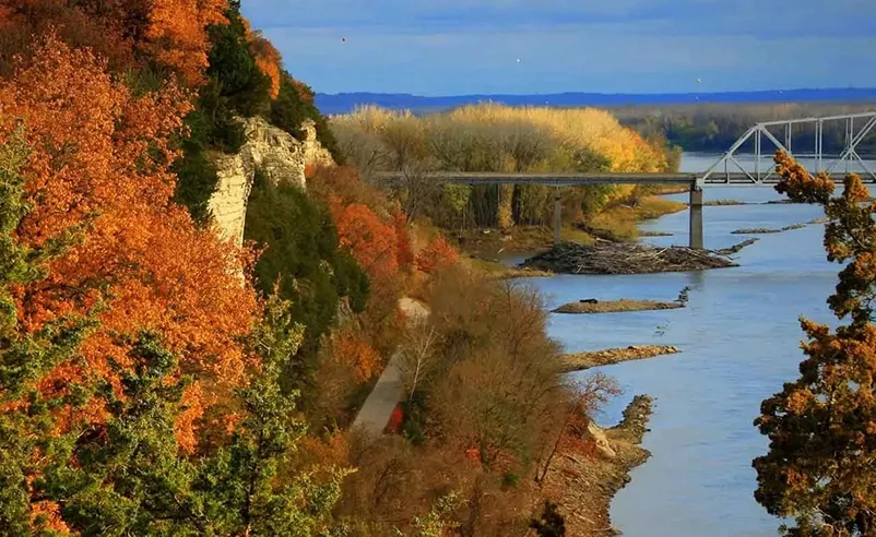 A majestic view of the Katy Trail State Park, along an abandoned railroad on the Missouri River.