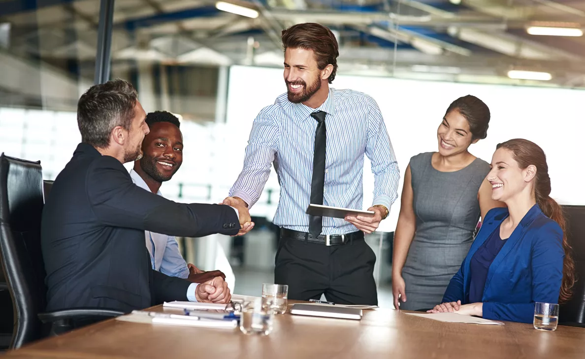 An Edward Jones client wraps up a meeting with a dedicated team that gave him personalized service.
