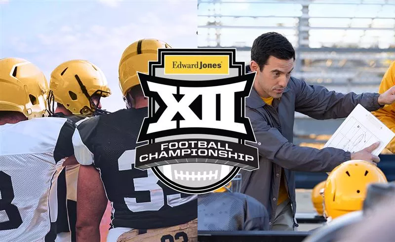  Football players wearing gold helmets huddle together in a rallying moment.
