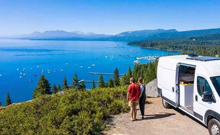 Couple camping at lake