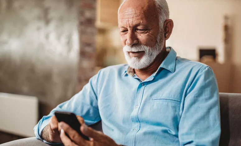 A client signs into his Edward Jones account from his mobile phone. A client signs into his Edward Jones account from his mobile phone.
